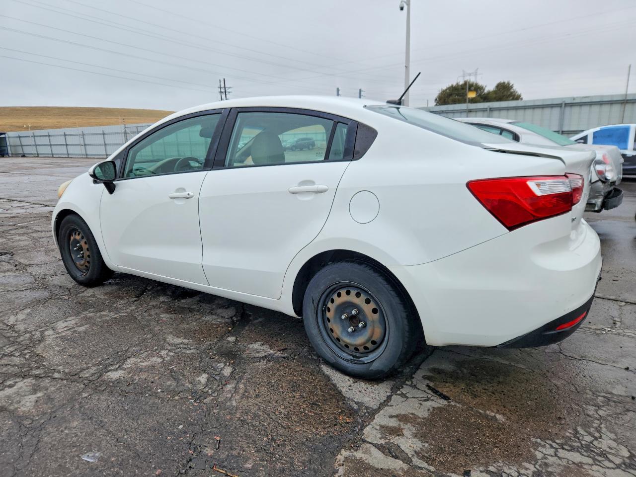 KNADM4A38D6290767 · 2013 KIA RIO · 2/12