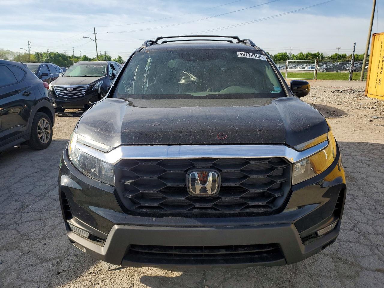 5FNYF8H52PB013909 · 2023 HONDA PASSPORT · 5/12