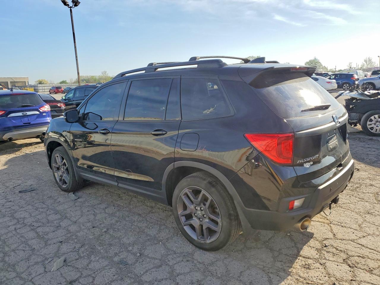 5FNYF8H52PB013909 · 2023 HONDA PASSPORT · 2/12