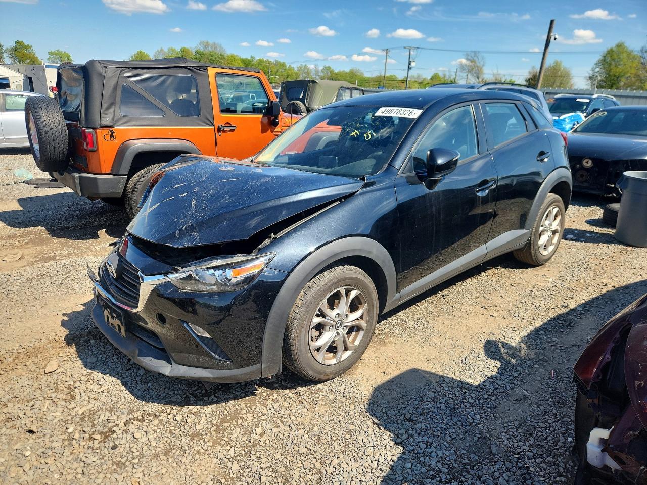JM1DKFB70K1423280 · 2019 MAZDA CX-3