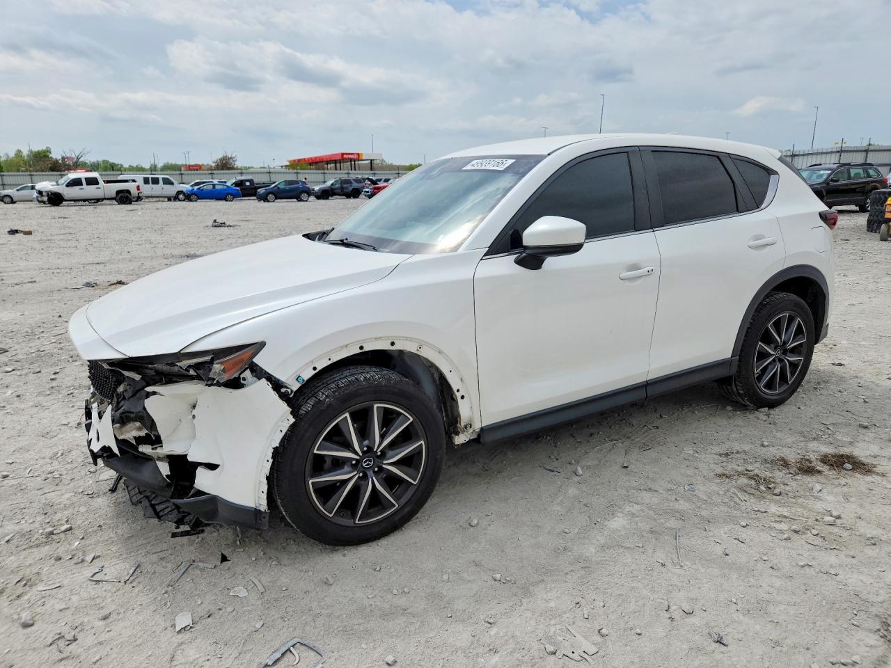 JM3KFACM4J1373721 · 2018 MAZDA CX-5