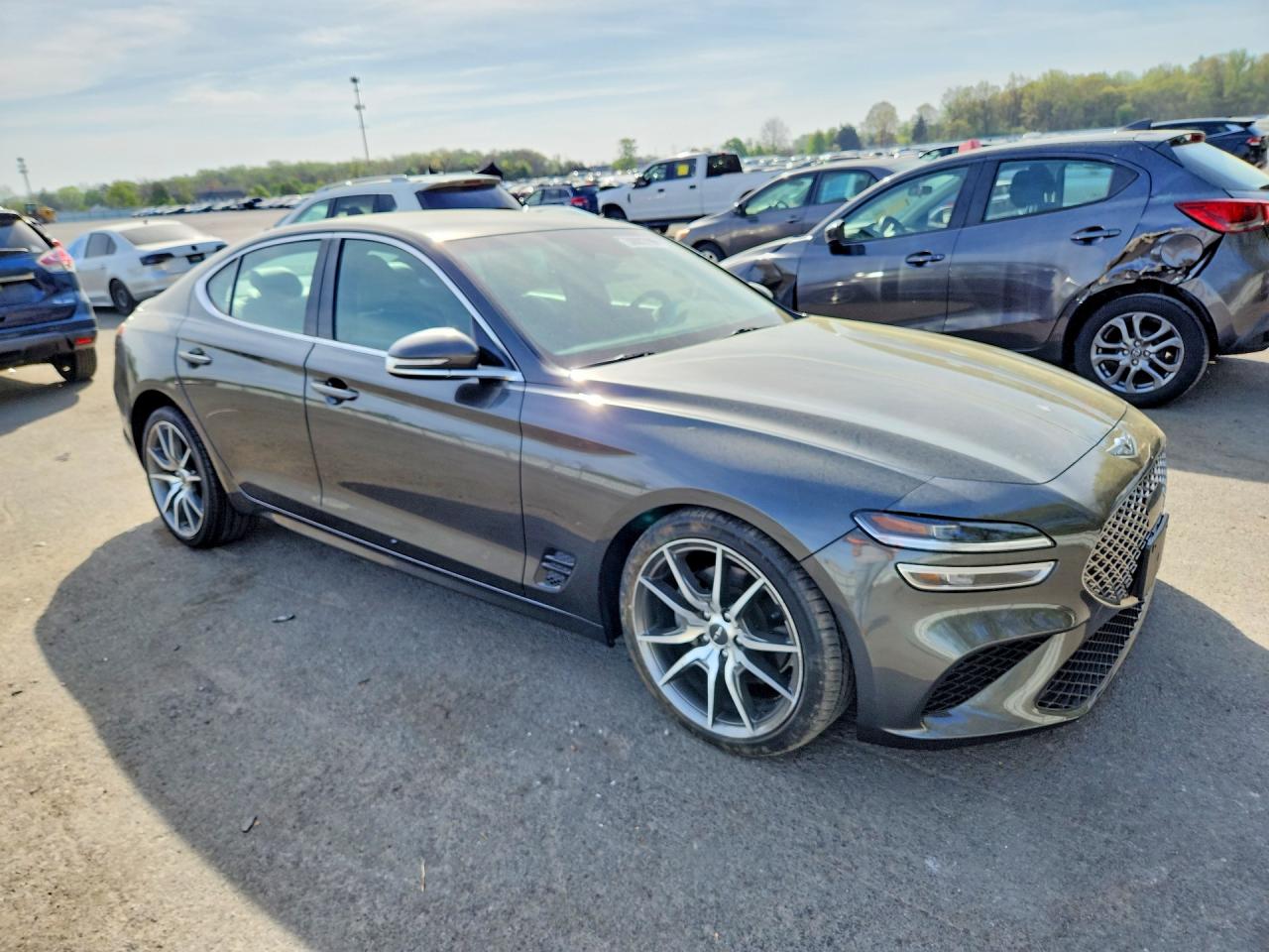 KMTG34TA2PU106004 · 2023 GENESIS G70 · 4/12