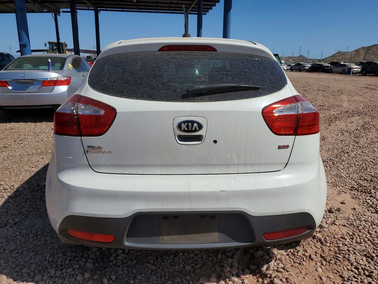 KNADM5A33F6500717 · 2015 KIA RIO · 6/12