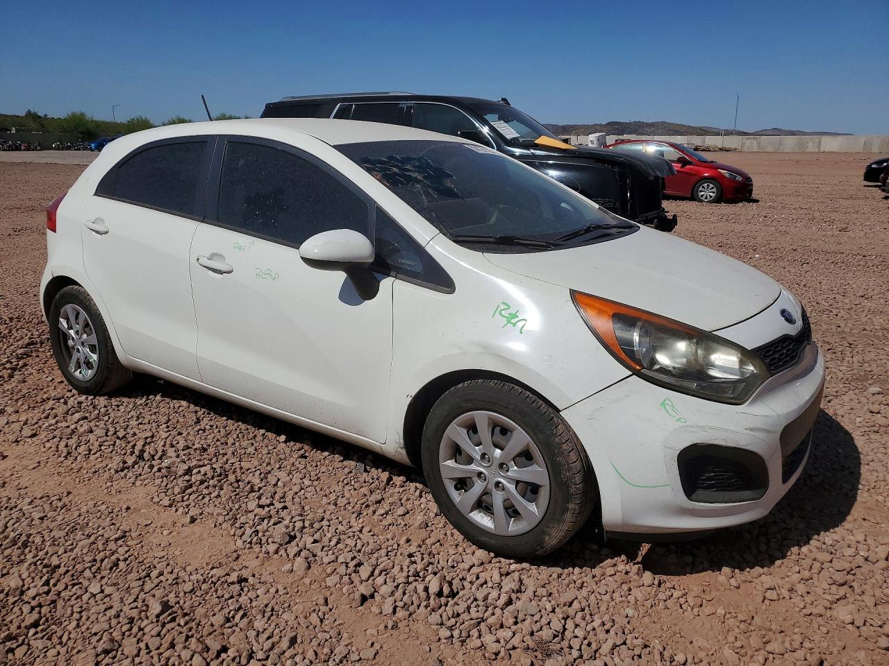 KNADM5A33F6500717 · 2015 KIA RIO · 4/12