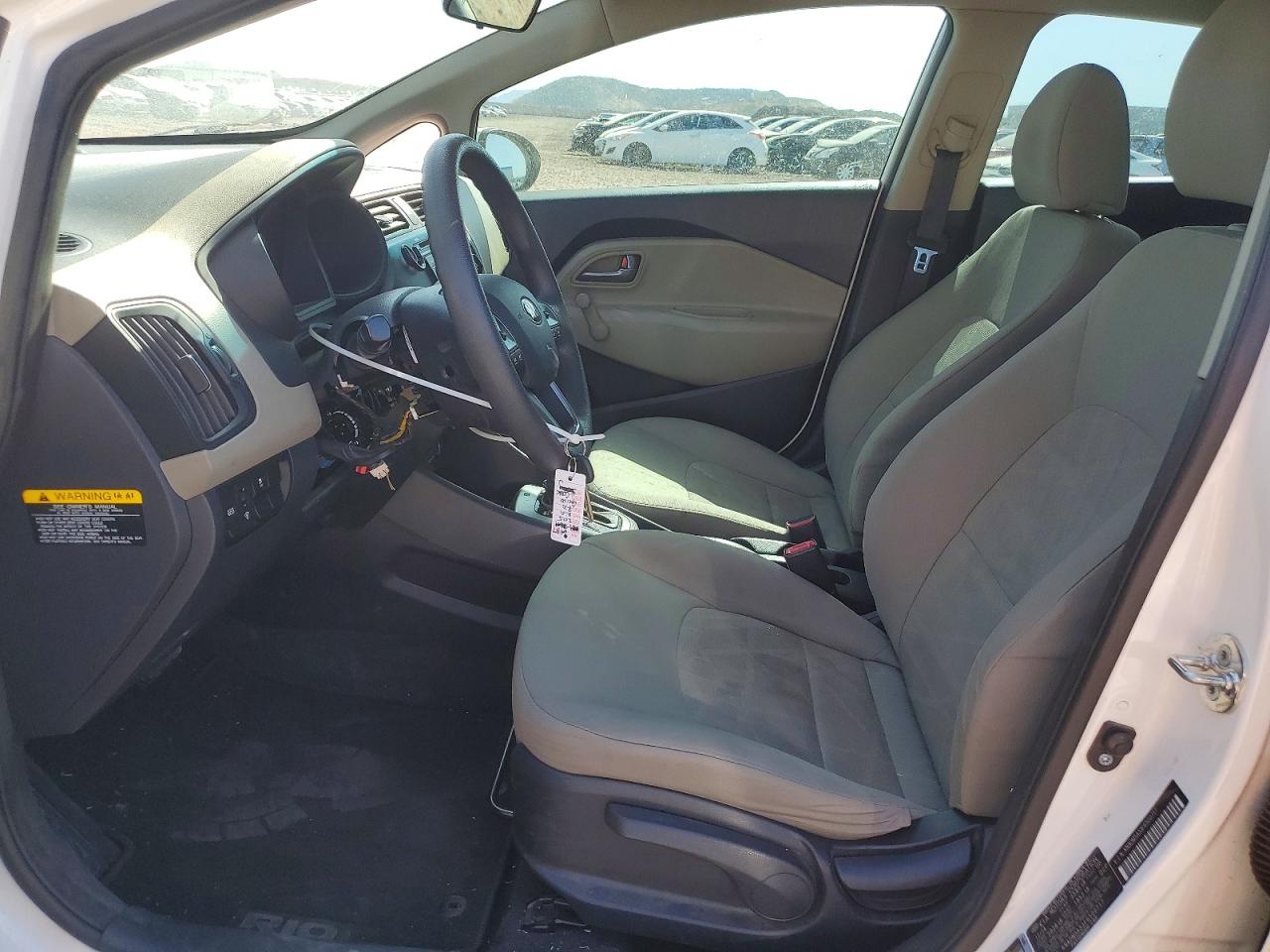 KNADM5A33F6500717 · 2015 KIA RIO · 7/12