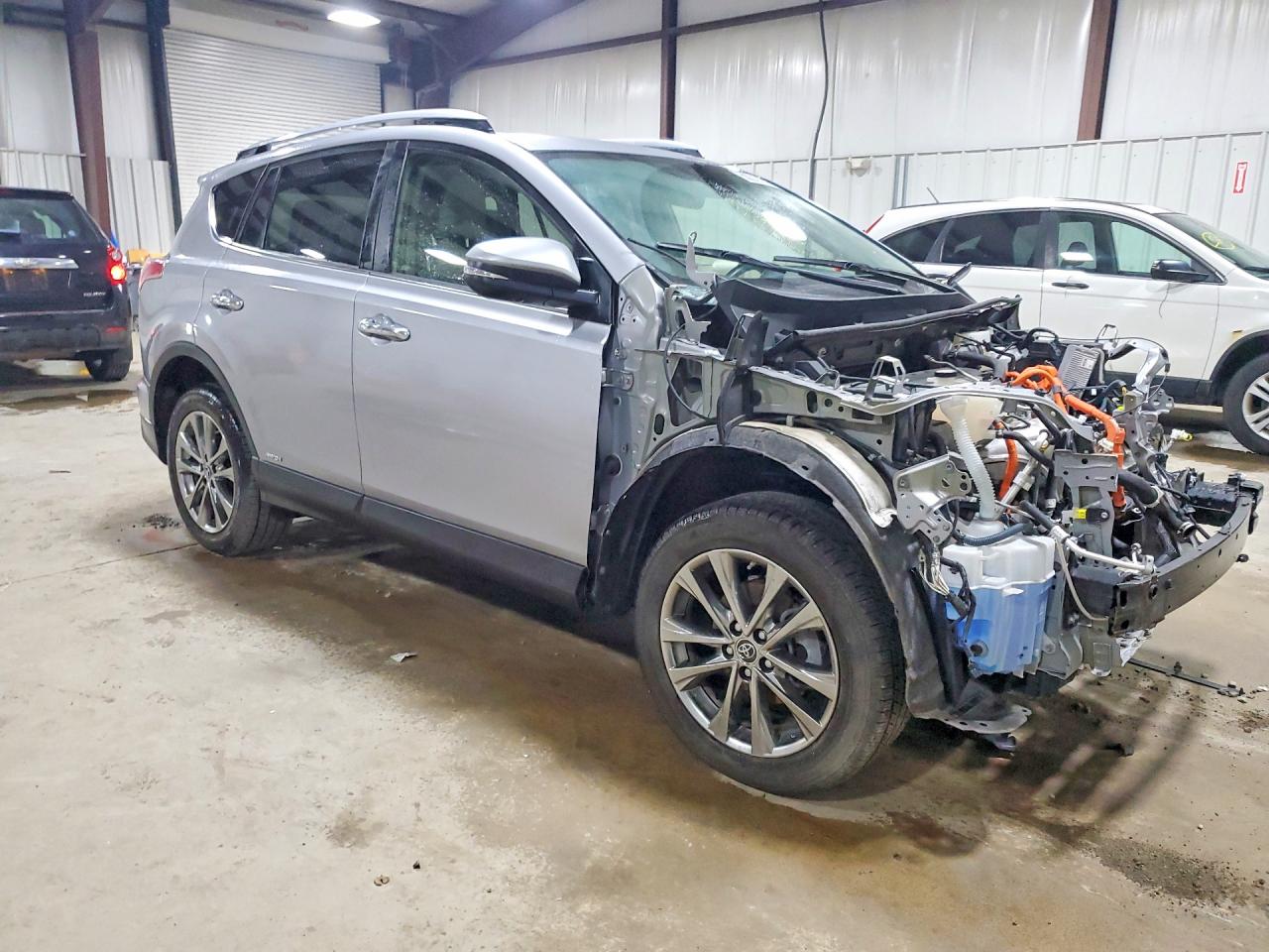 JTMDJREV0JD163832 · 2018 TOYOTA RAV4 HV · 4/14
