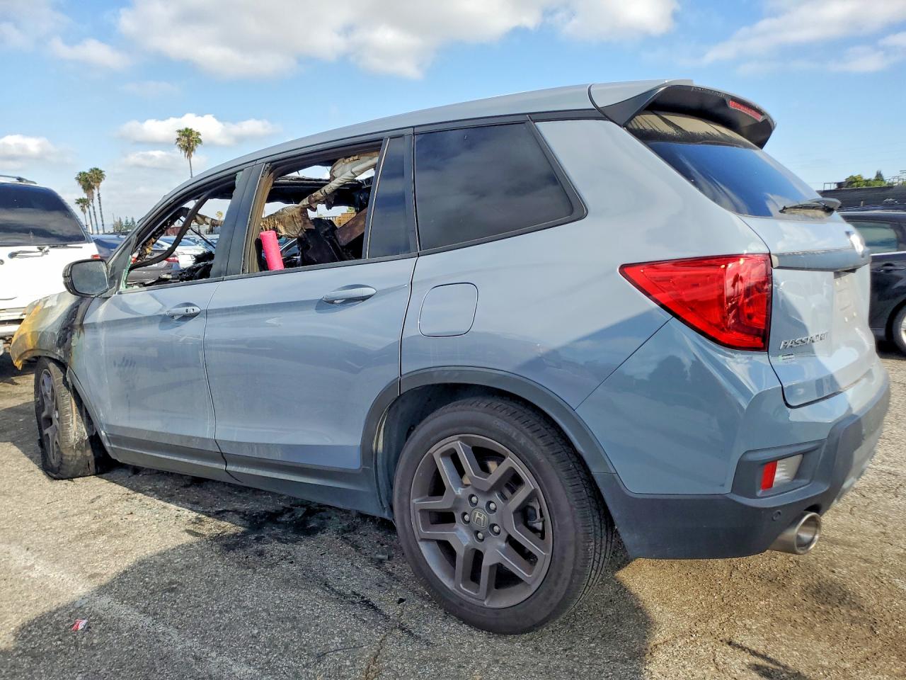 5FNYF7H55NB002765 · 2022 HONDA PASSPORT · 2/13