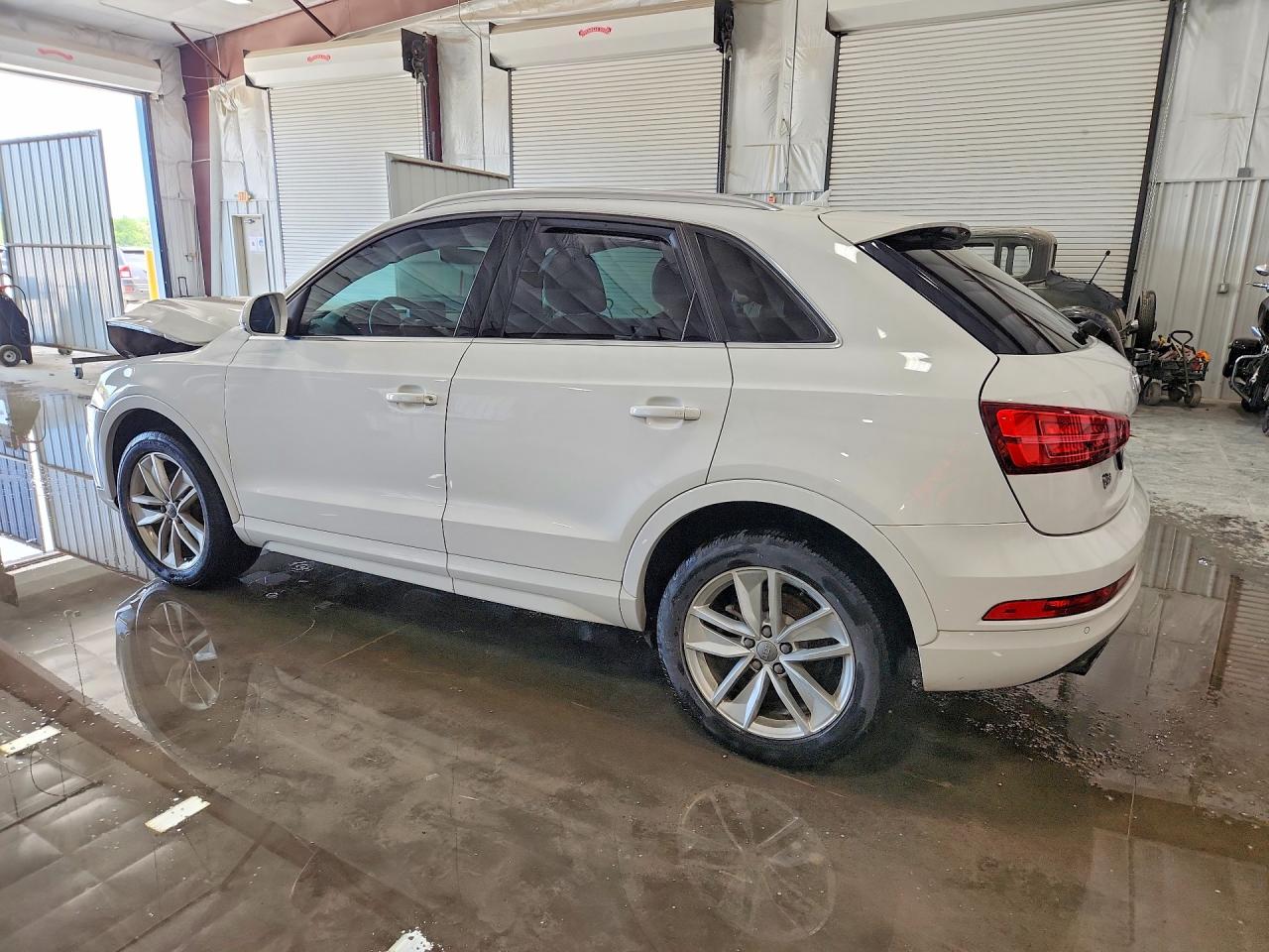 WA1BFCFS6GR015054 · 2016 AUDI Q3 · 2/12