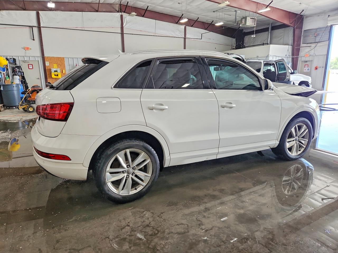 WA1BFCFS6GR015054 · 2016 AUDI Q3 · 3/12