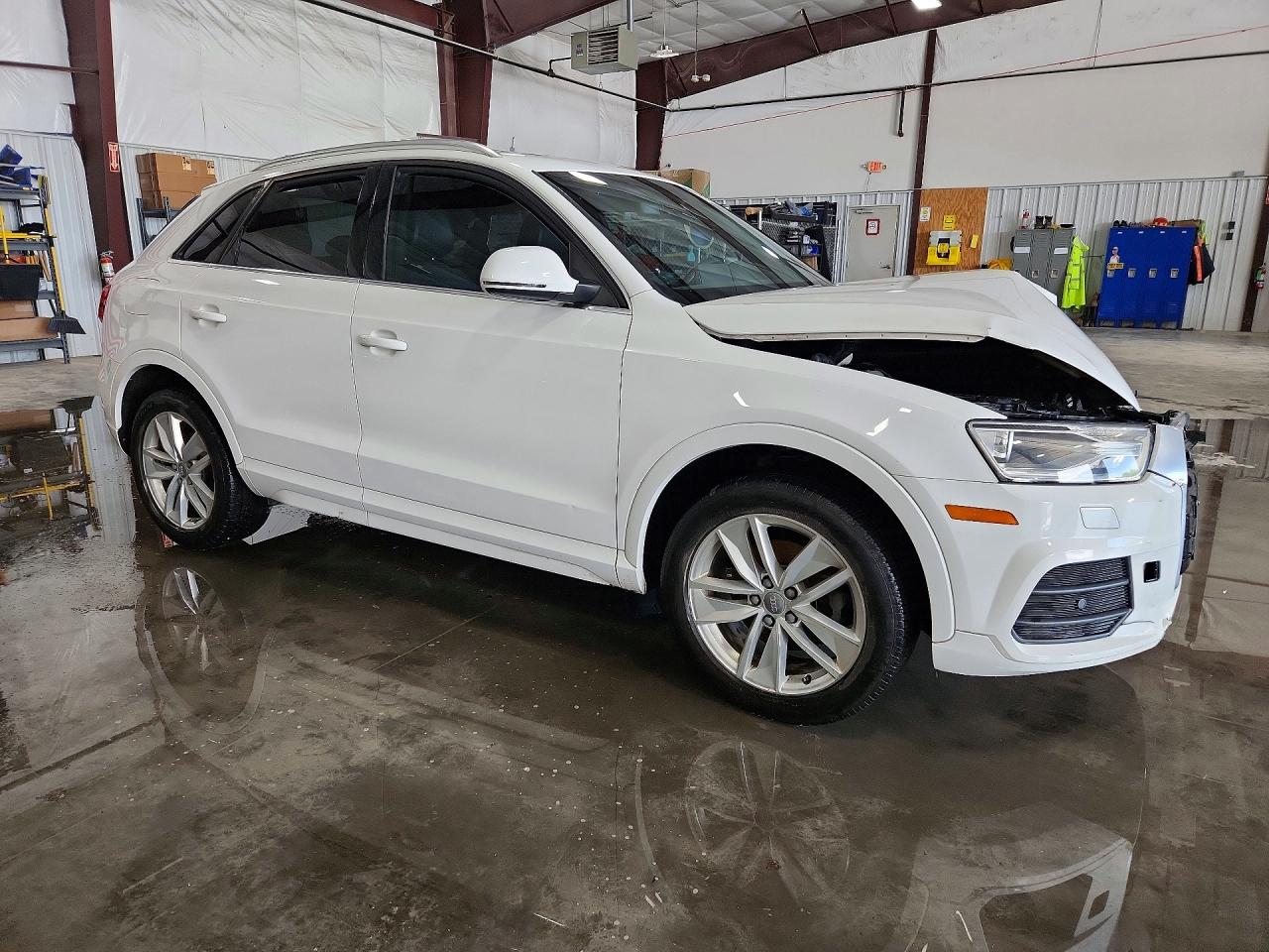 WA1BFCFS6GR015054 · 2016 AUDI Q3 · 4/12