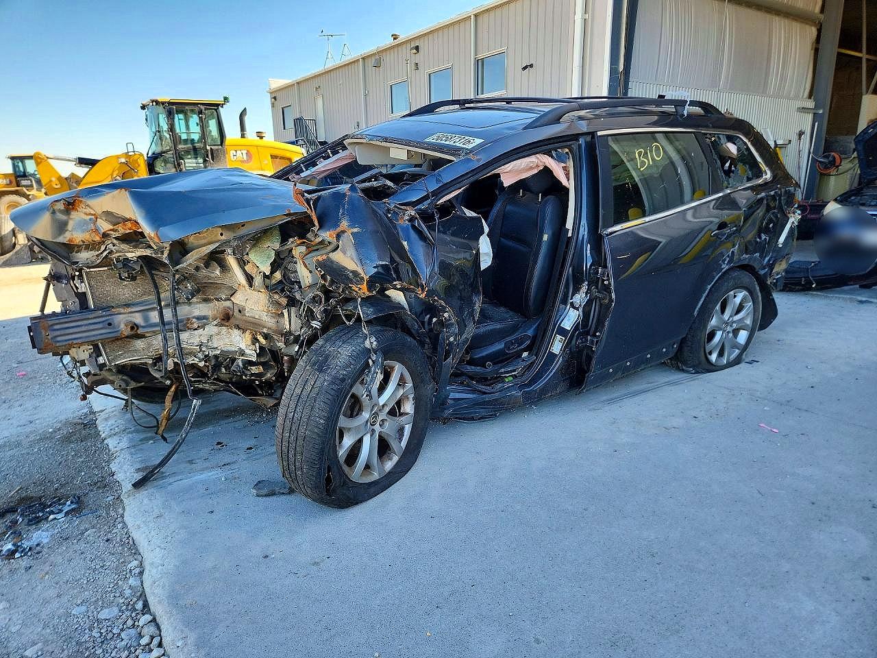 JM3TB3CA4F0448710 · 2015 MAZDA CX-9
