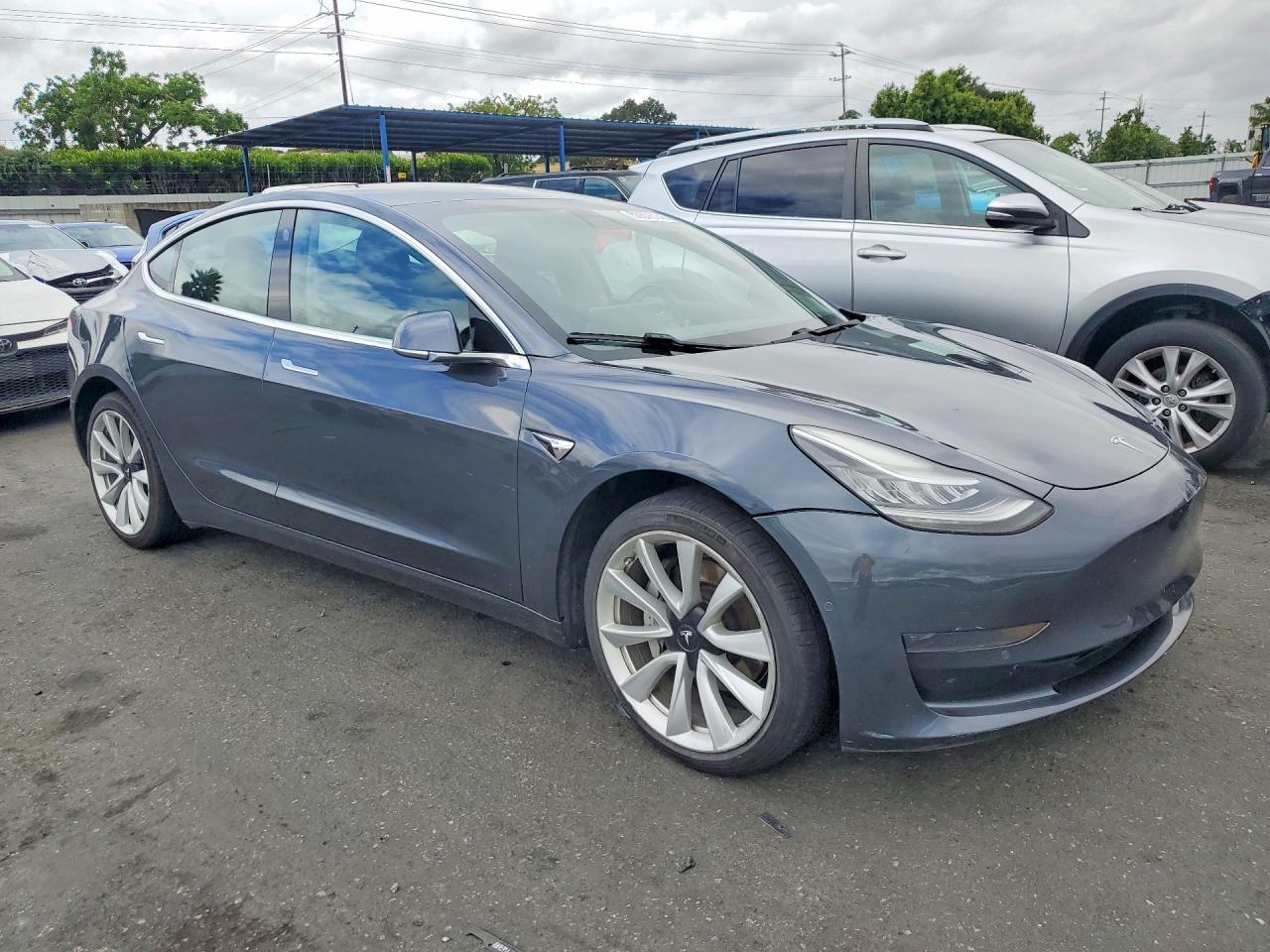 5YJ3E1EA3KF475961 · 2019 TESLA MODEL 3 · 4/12