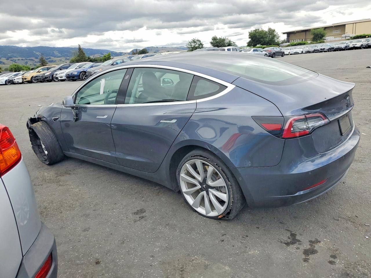 5YJ3E1EA3KF475961 · 2019 TESLA MODEL 3 · 2/12