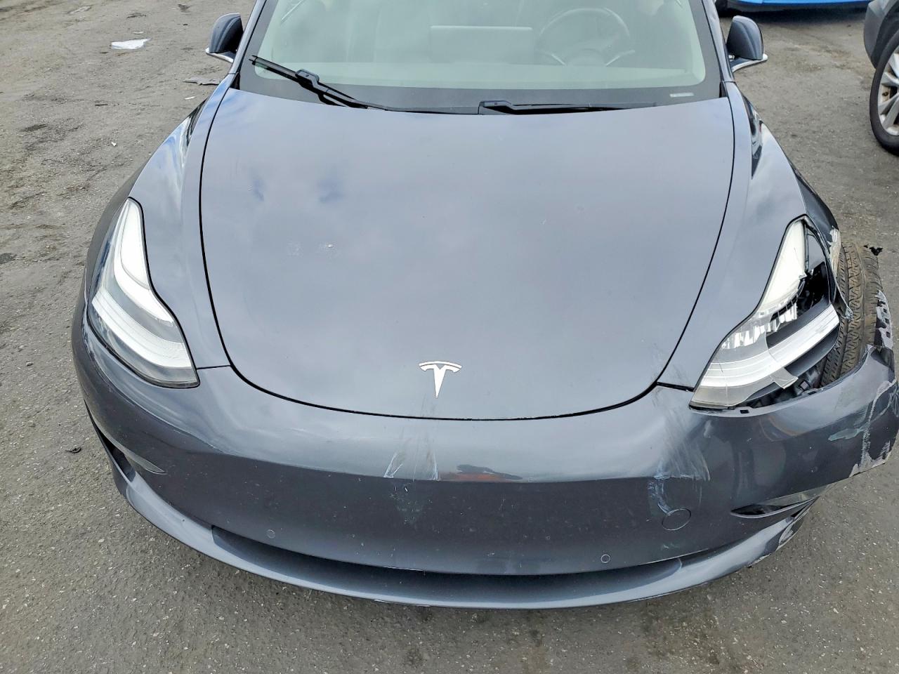 5YJ3E1EA3KF475961 · 2019 TESLA MODEL 3 · 11/12