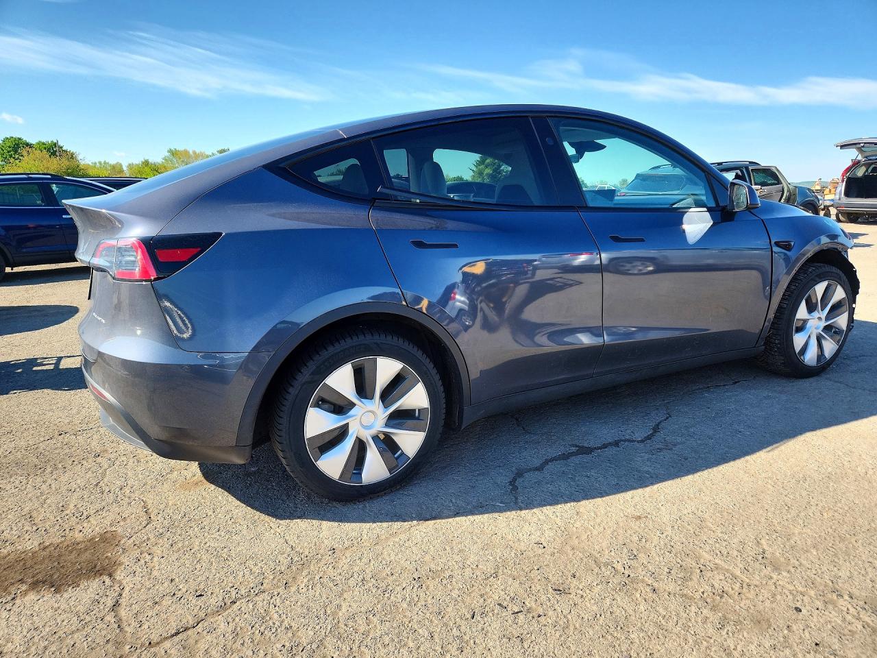 7SAYGDEE4PF832210 · 2023 TESLA MODEL Y · 3/13