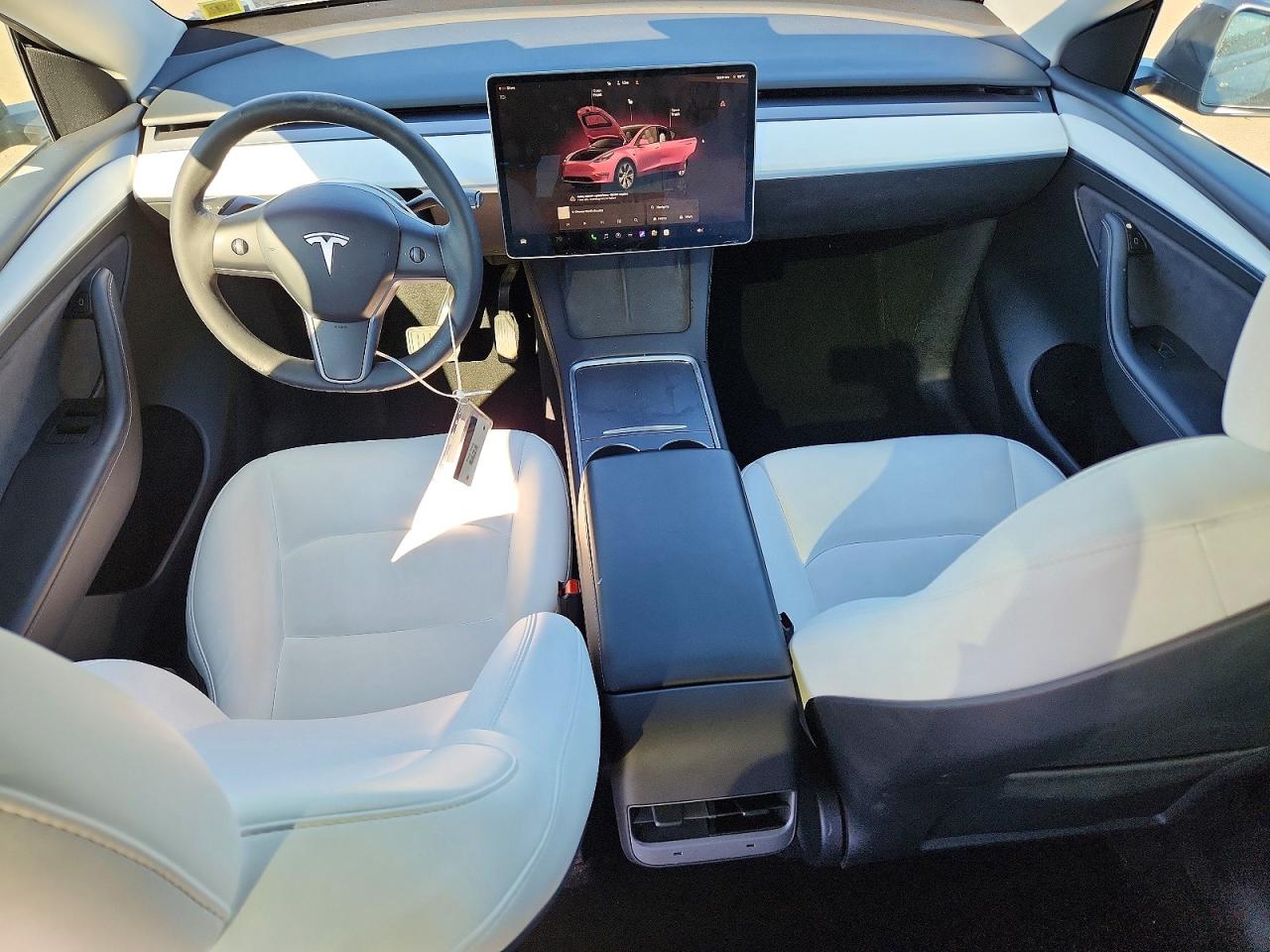 7SAYGDEE4PF832210 · 2023 TESLA MODEL Y · 8/13