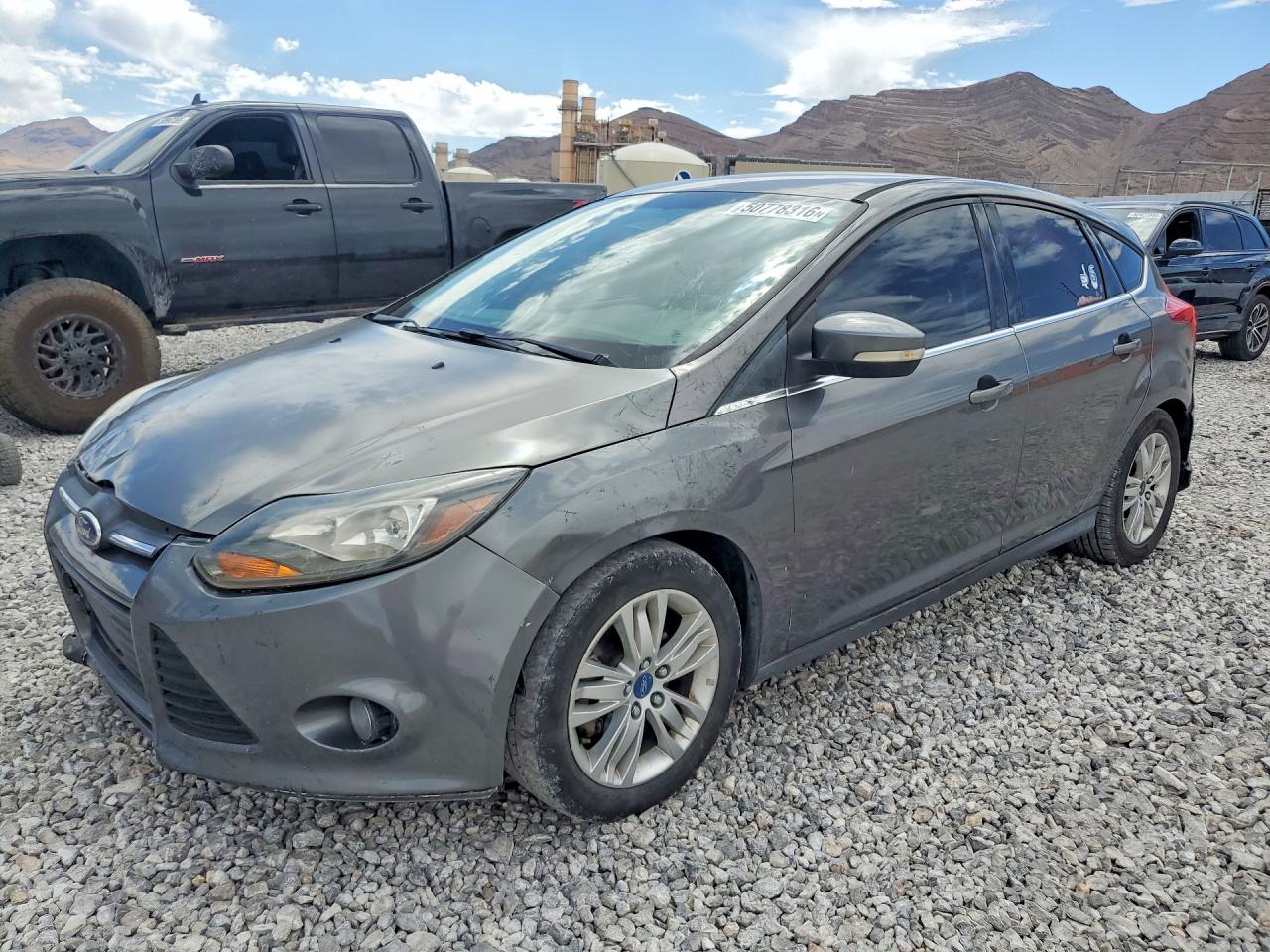 1FAHP3M24CL373708 · 2012 FORD FOCUS