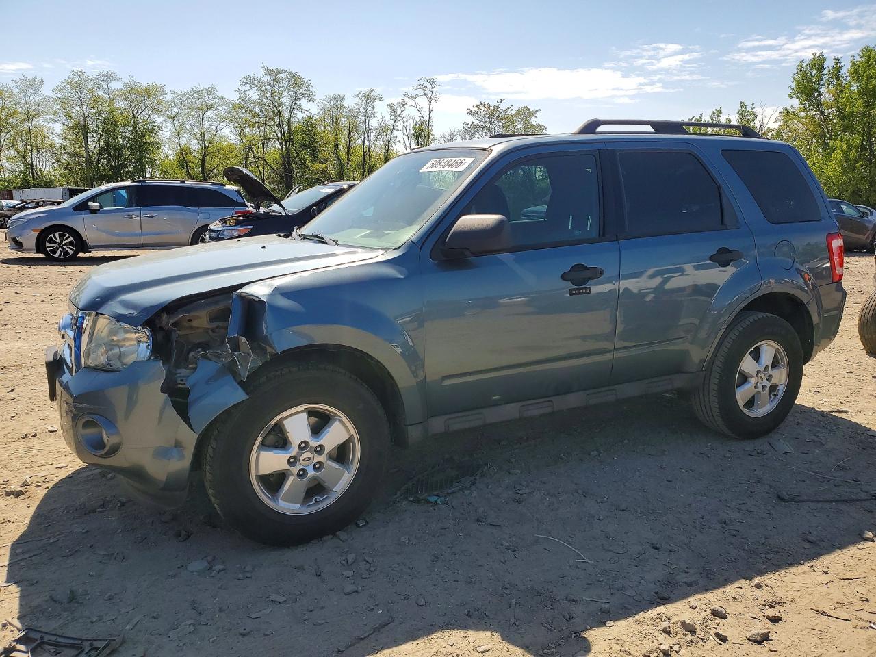1FMCU0DG1BKC09095 · 2011 FORD ESCAPE