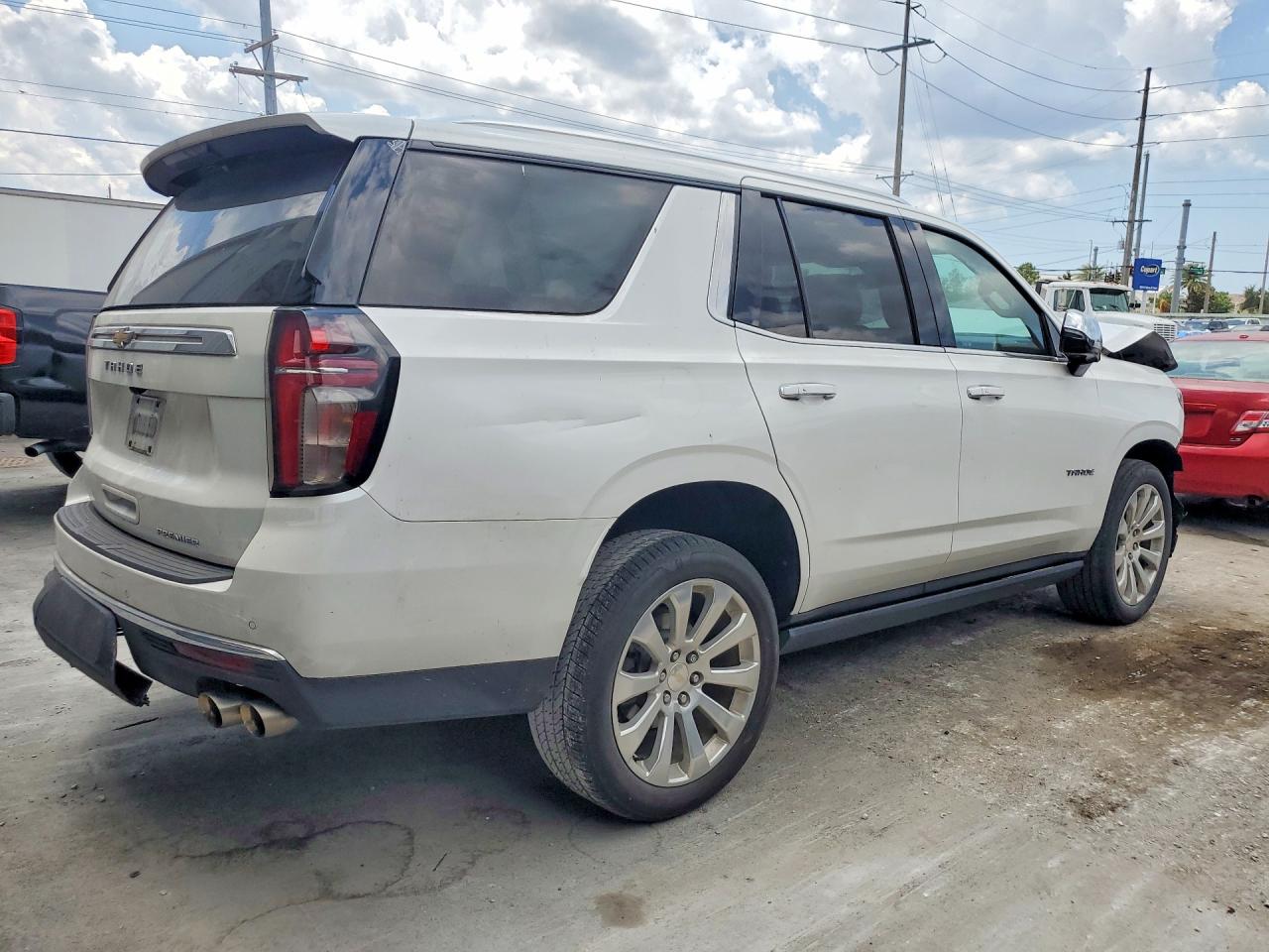 1GNSCSKD9MR319157 · 2021 CHEVROLET TAHOE · 3/14