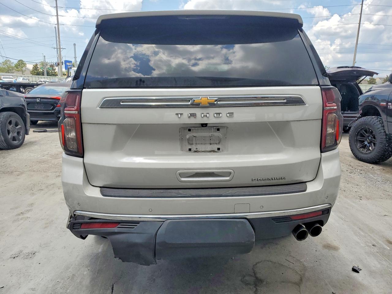 1GNSCSKD9MR319157 · 2021 CHEVROLET TAHOE · 6/14