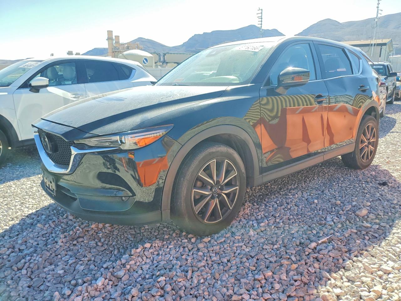 JM3KFBDM9J0338635 · 2018 MAZDA CX-5
