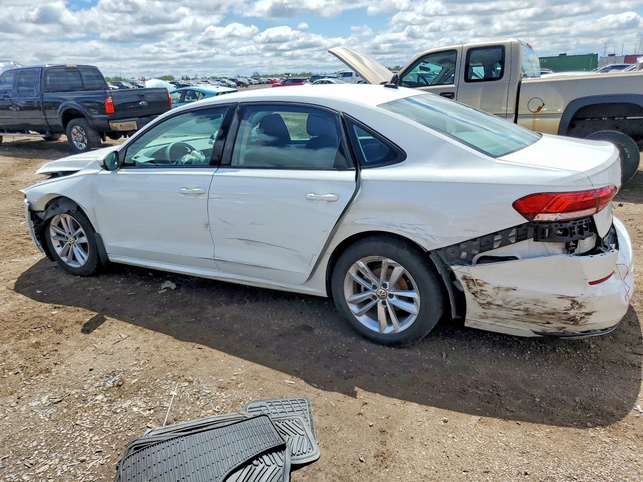 1VWAA7A33LC002599 · 2020 VOLKSWAGEN PASSAT · 2/12