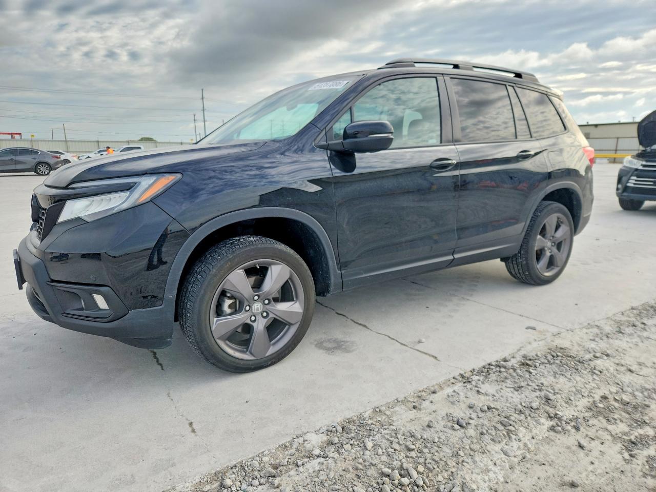 5FNYF8H96MB040898 · 2021 HONDA PASSPORT