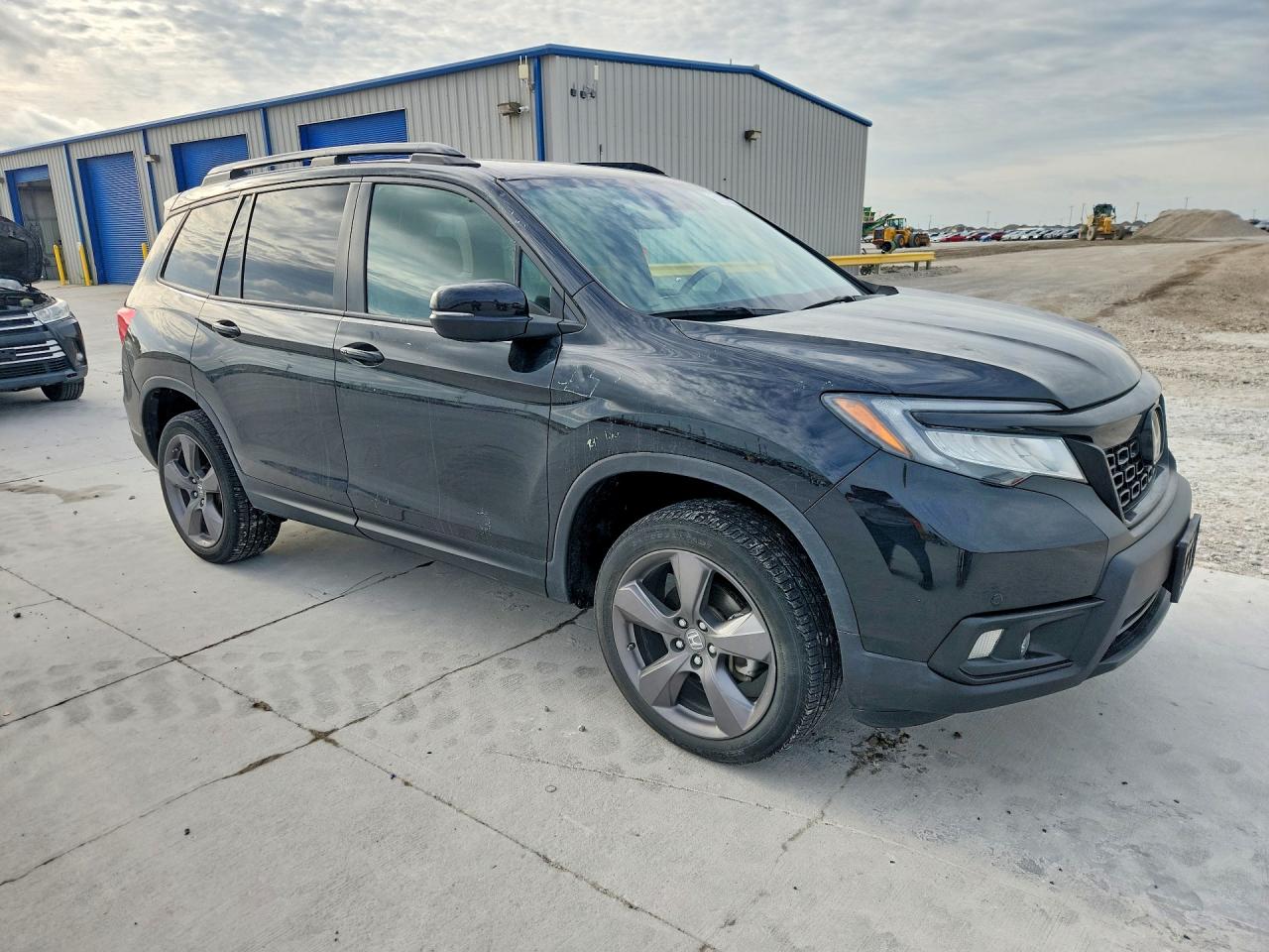 5FNYF8H96MB040898 · 2021 HONDA PASSPORT · 4/13