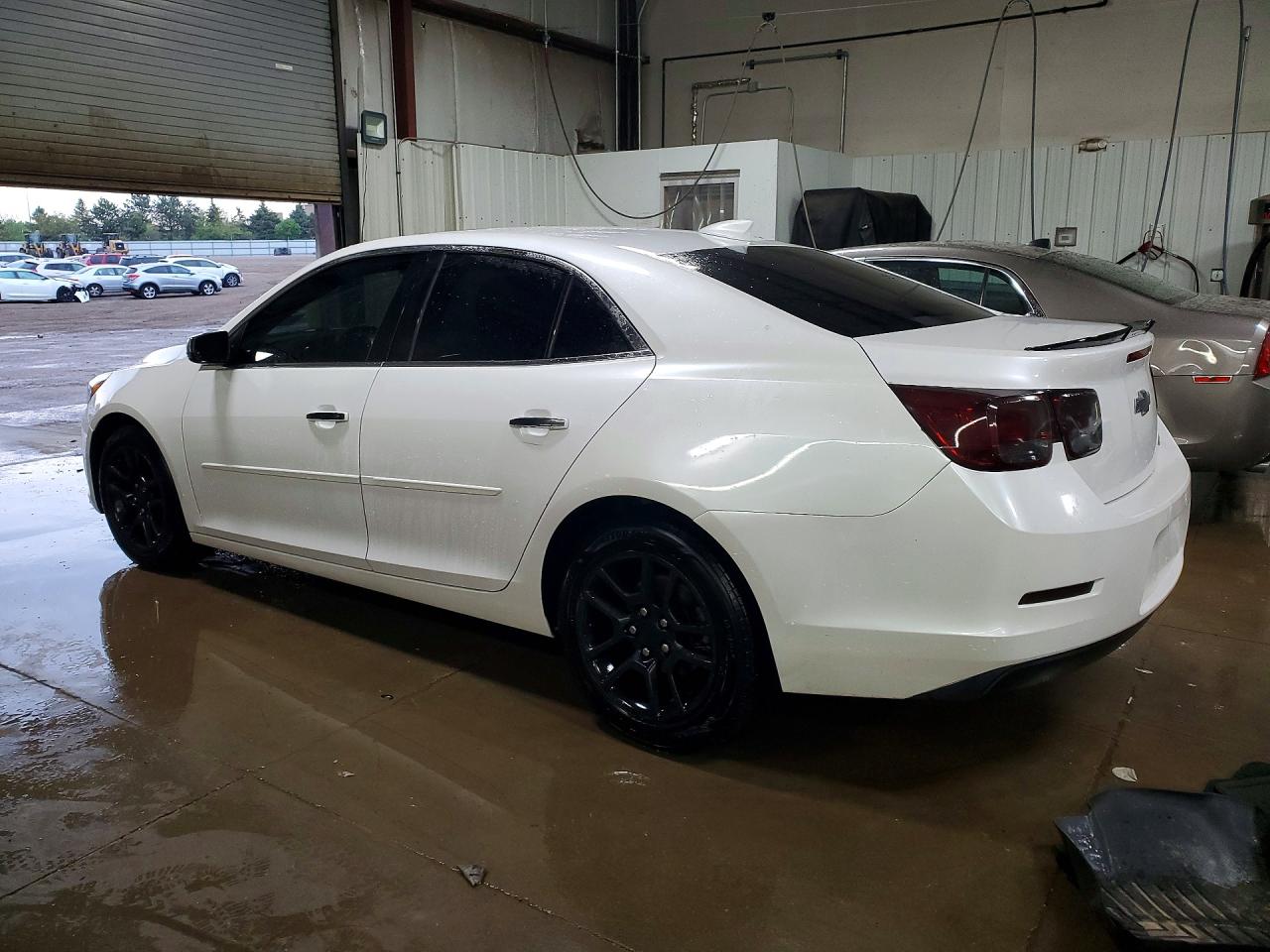1G11C5SAXGF142208 · 2016 CHEVROLET MALIBU LIMITED · 2/12