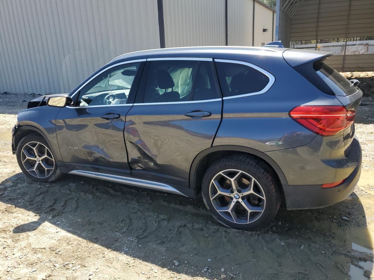 WBXHT3C39J5K22593 · 2018 BMW X1 · 2/12