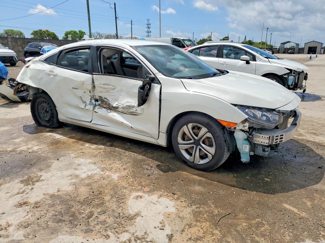 2HGFC2F59JH601695 · 2018 HONDA CIVIC · 4/13