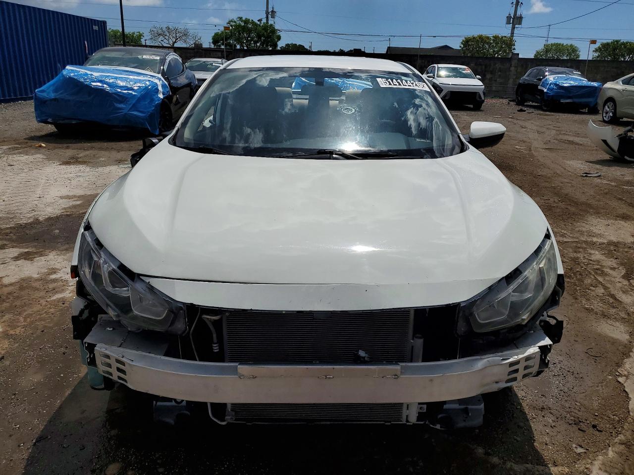 2HGFC2F59JH601695 · 2018 HONDA CIVIC · 5/13