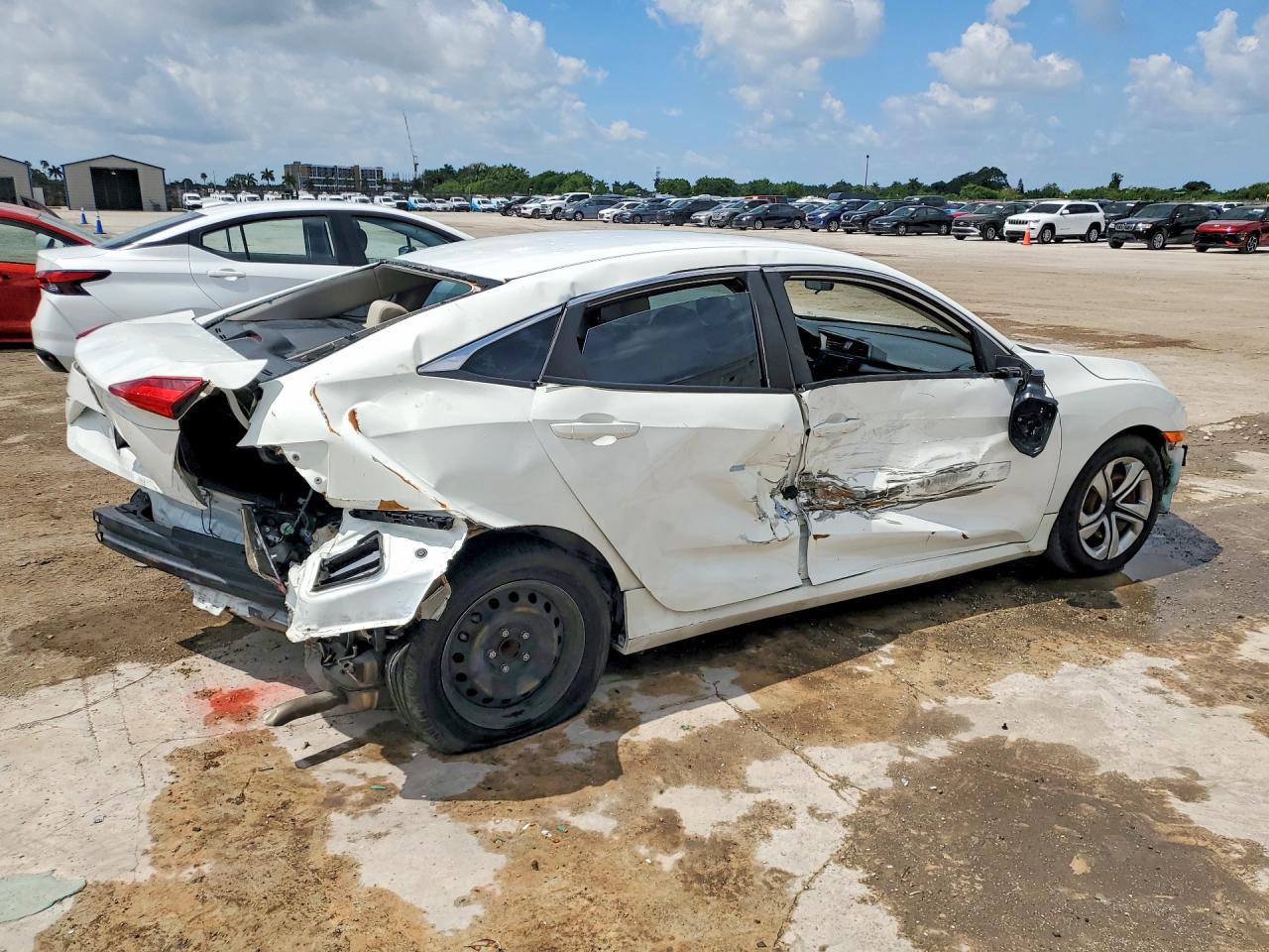 2HGFC2F59JH601695 · 2018 HONDA CIVIC · 3/13