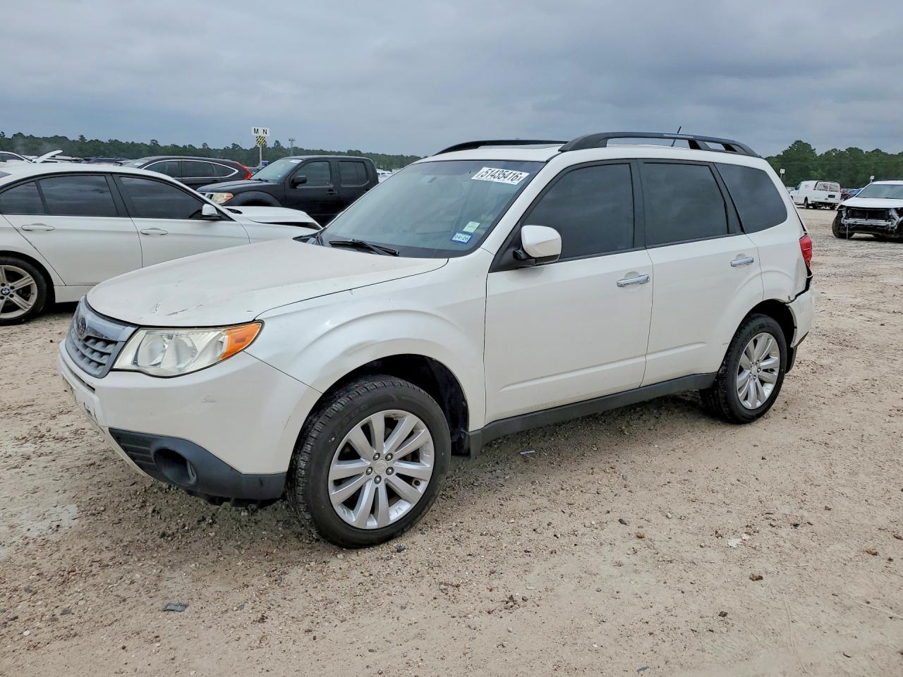 JF2SHBECXBH704728 · 2011 SUBARU FORESTER
