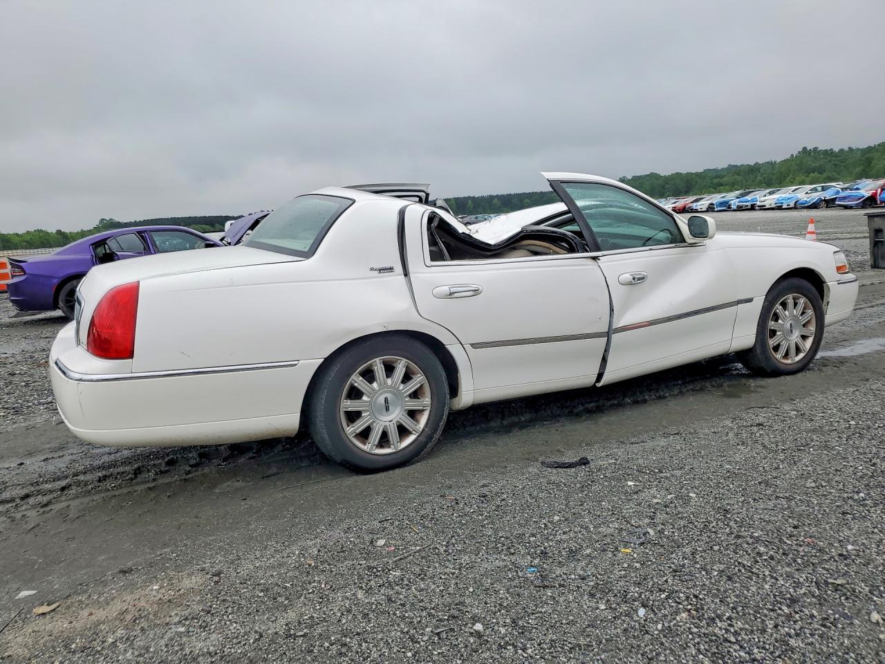 2LNHM82V49X618785 · 2009 LINCOLN TOWN CAR · 3/12
