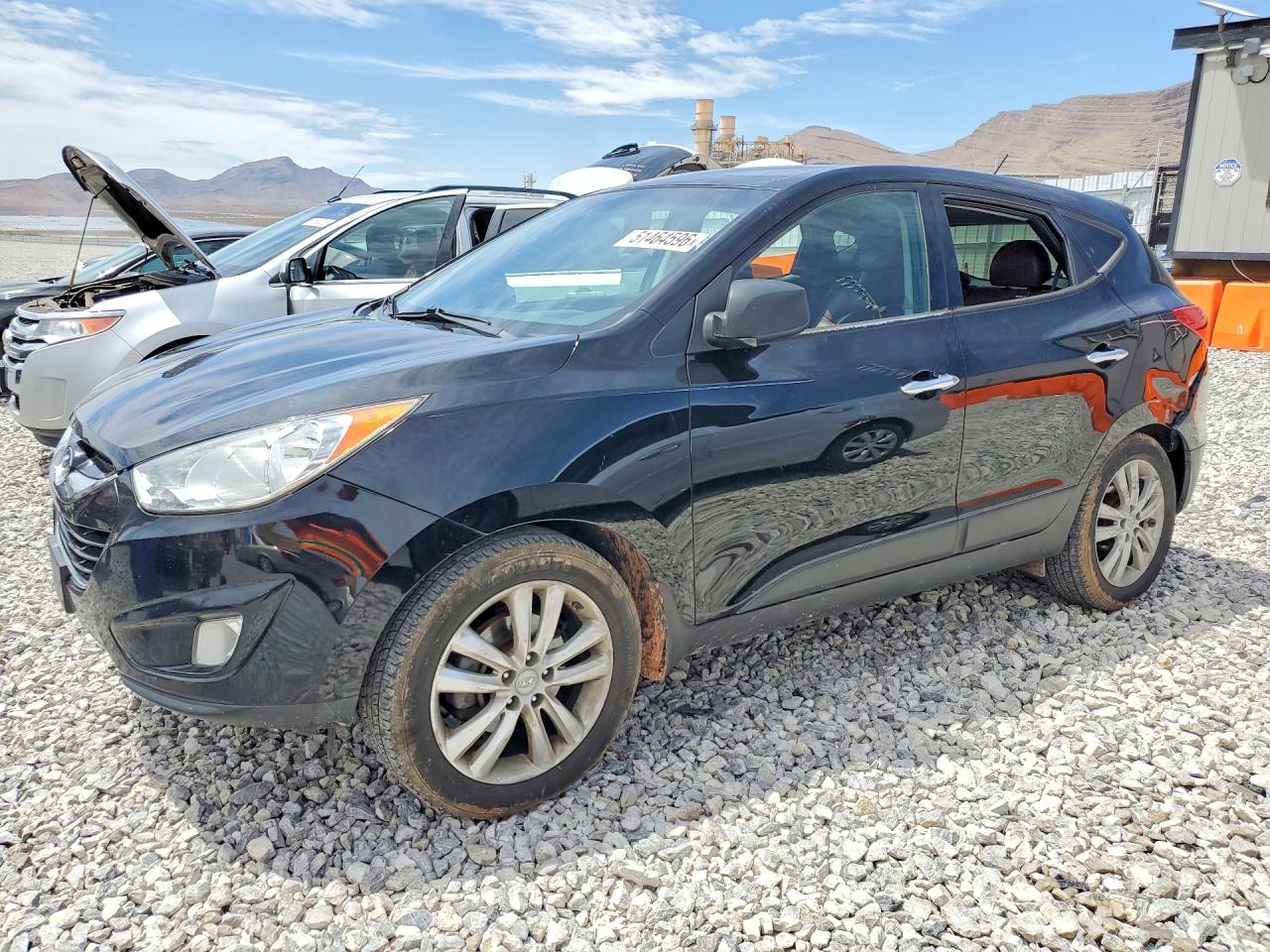 KM8JUCAC2BU312122 · 2011 HYUNDAI TUCSON