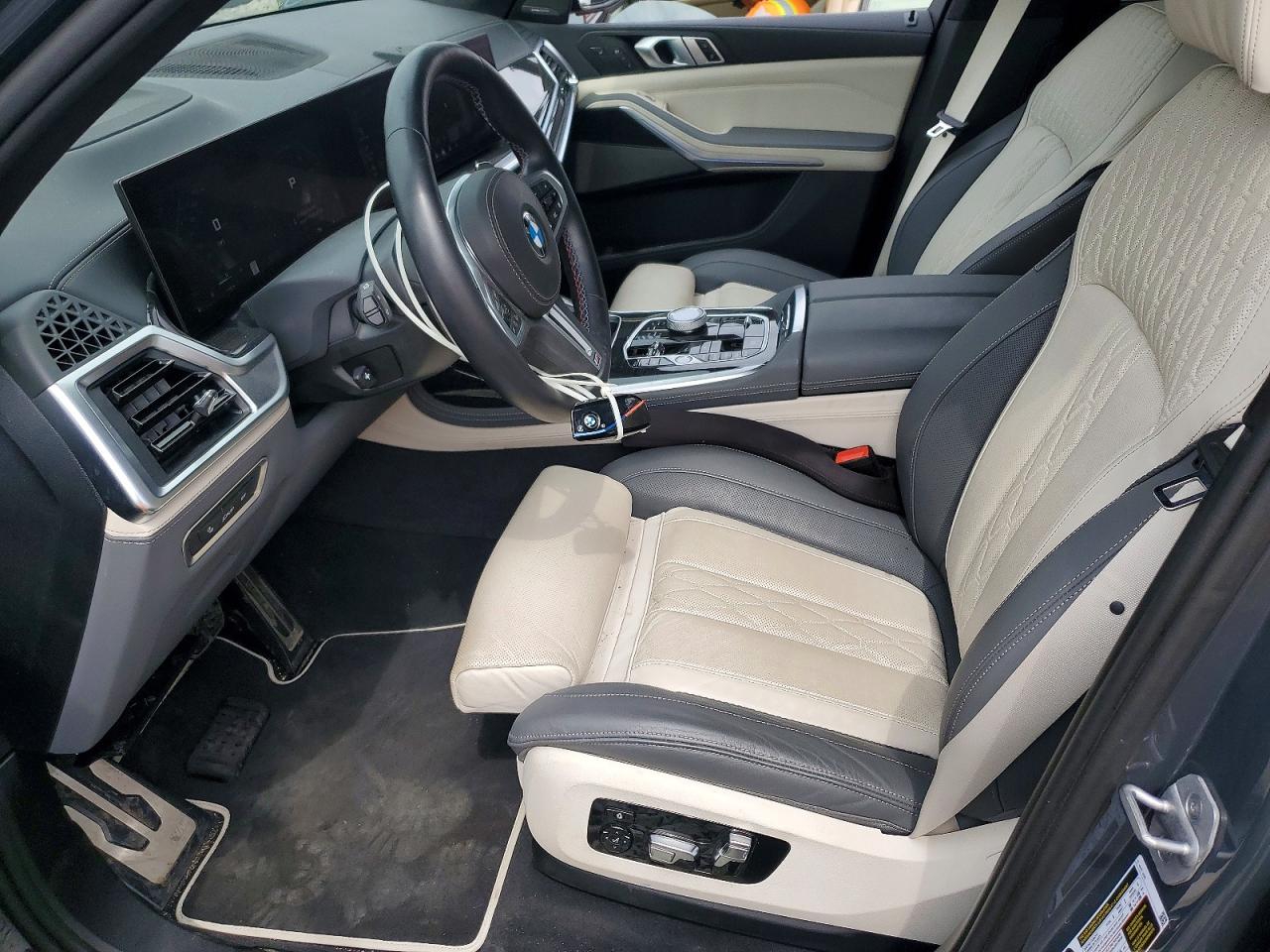 NJ2447E · 2025 BMW X7 · 7/13