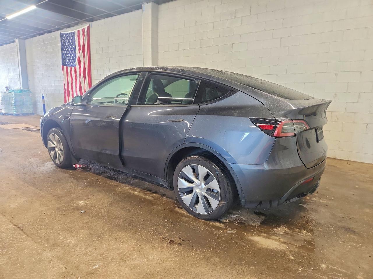 7SAYGDEE2PF610247 · 2023 TESLA MODEL Y · 2/12
