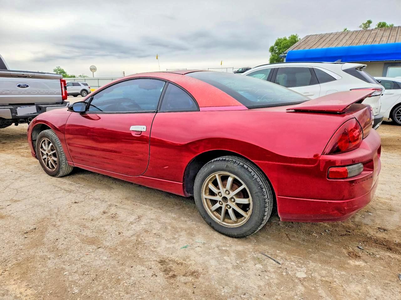 4A3AC44G8YE023614 · 2000 MITSUBISHI ECLIPSE · 2/12