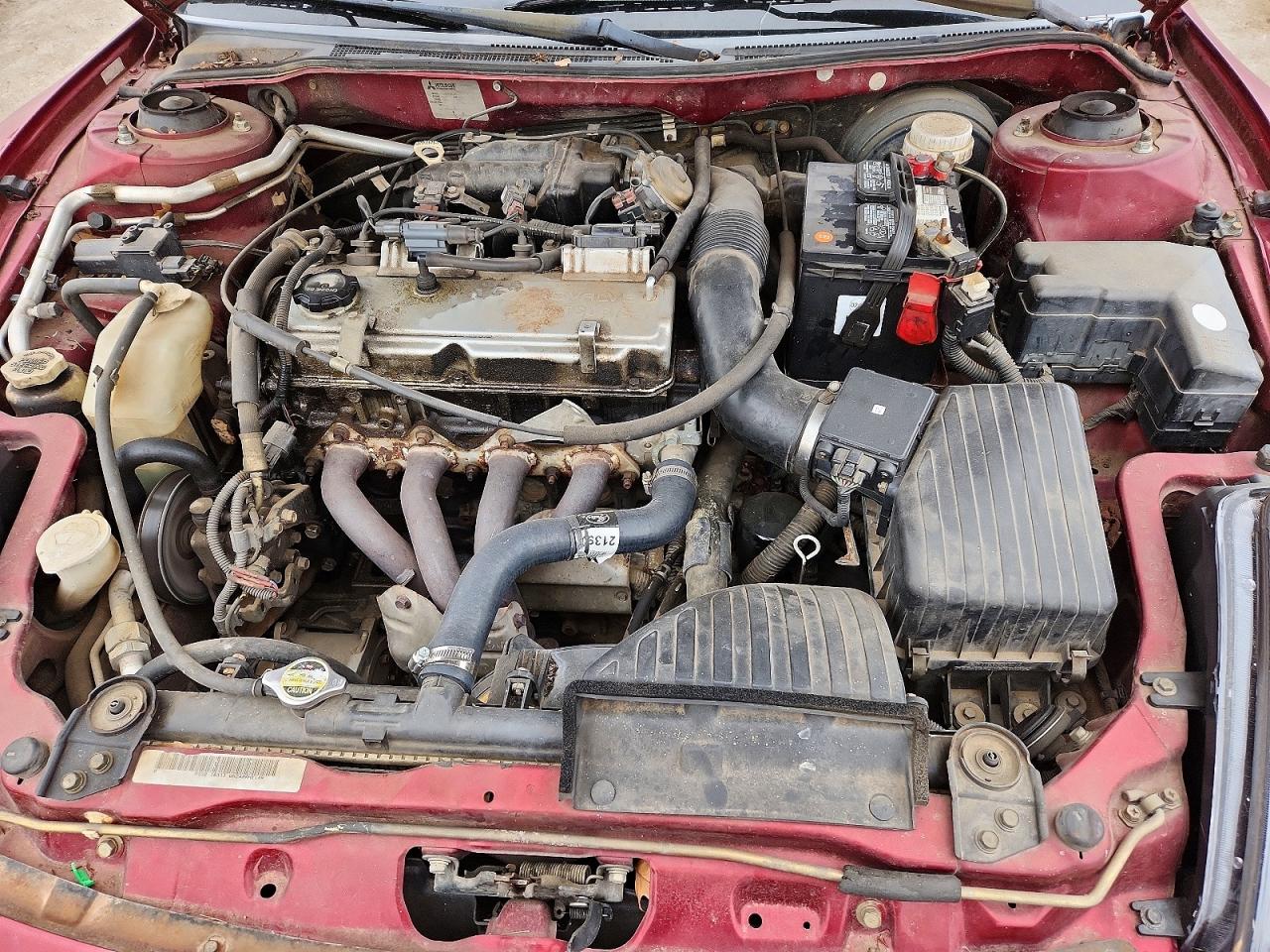 4A3AC44G8YE023614 · 2000 MITSUBISHI ECLIPSE · 11/12