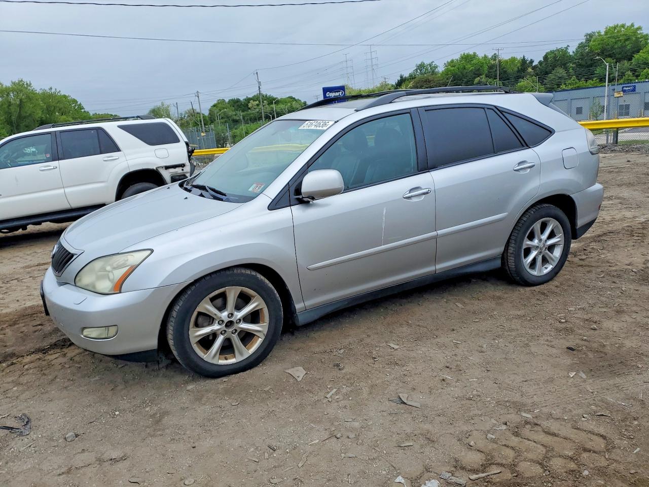 2T2HK31U99C119776 · 2009 LEXUS RX