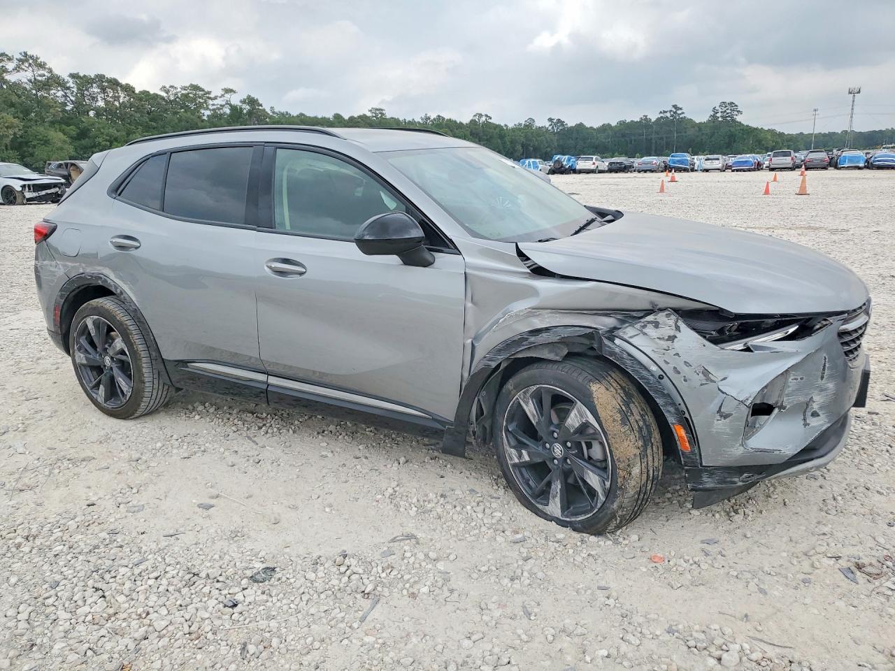 LRBAZLR40PD067085 · 2023 BUICK ENVISION · 4/13