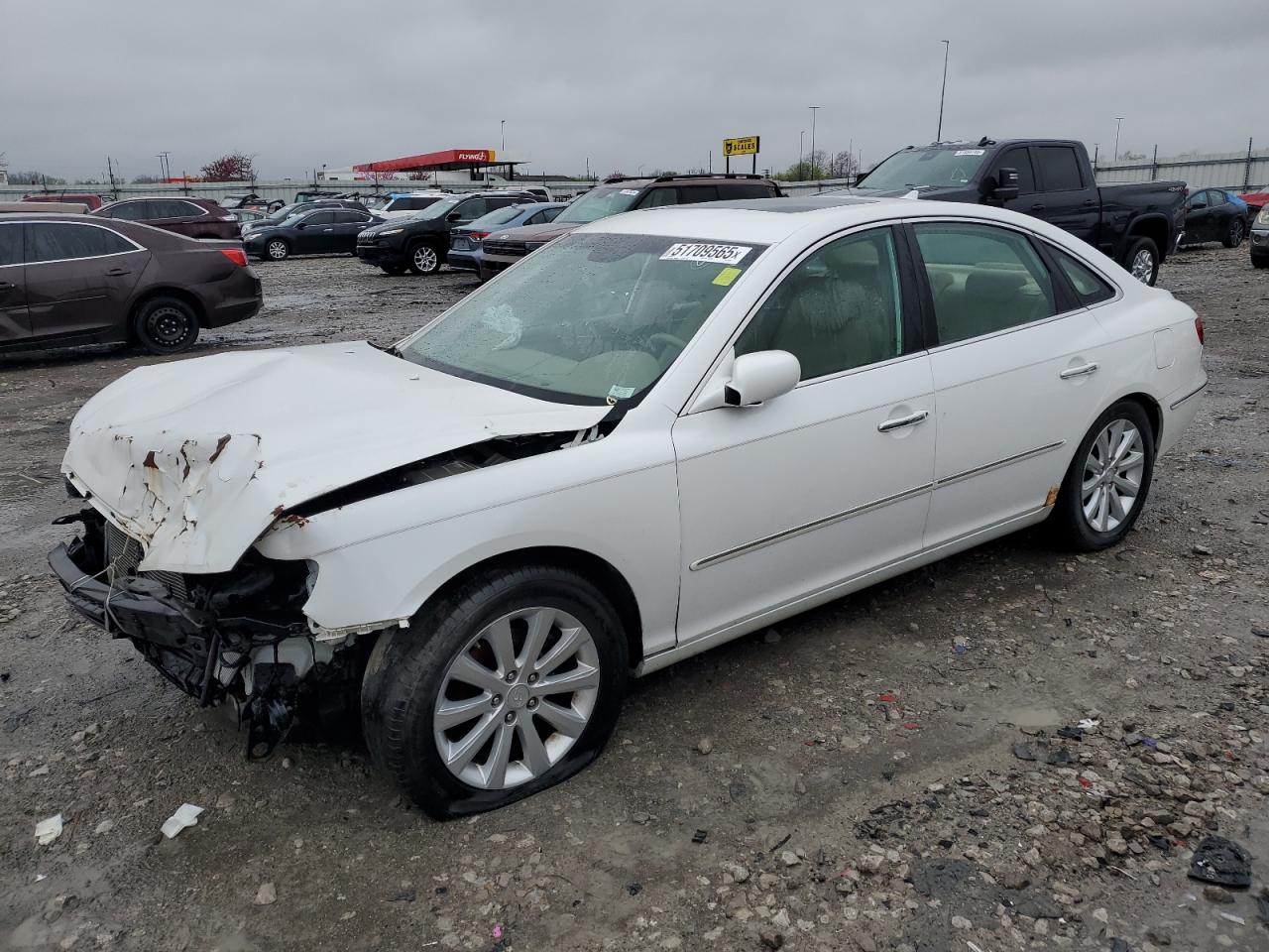 KMHFC46D39A351698 · 2009 HYUNDAI AZERA