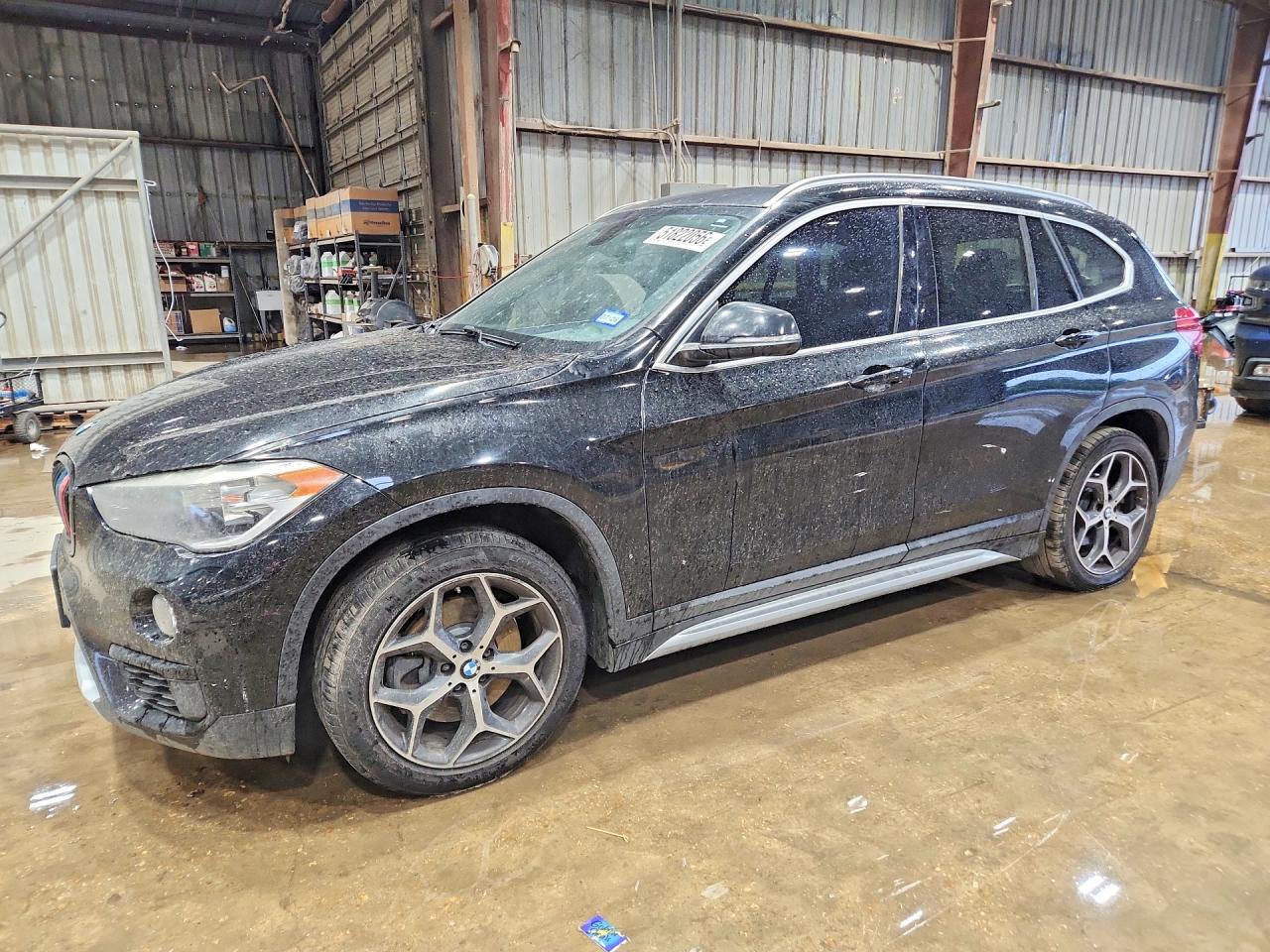 WBXHU7C37J5L06299 · 2018 BMW X1