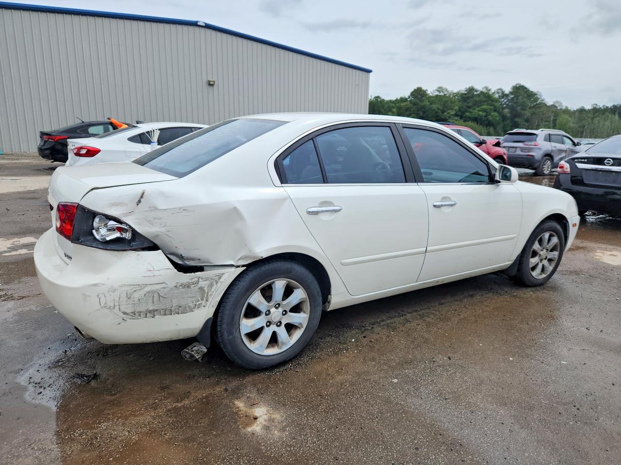 KNAGE124065073920 · 2006 KIA OPTIMA · 3/9