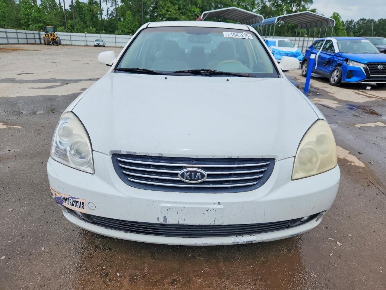 KNAGE124065073920 · 2006 KIA OPTIMA · 5/9