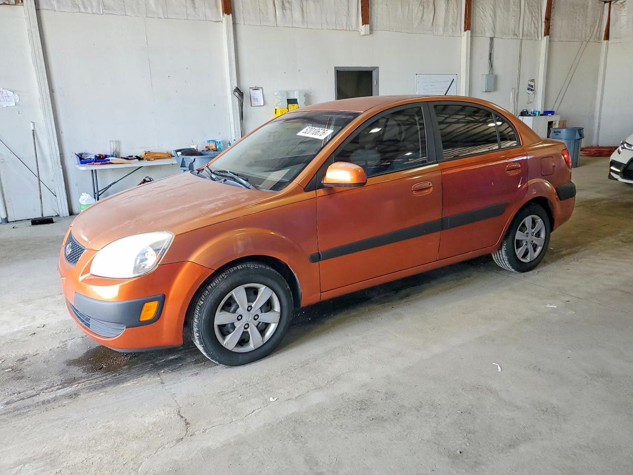 KNADE223796534285 · 2009 KIA RIO