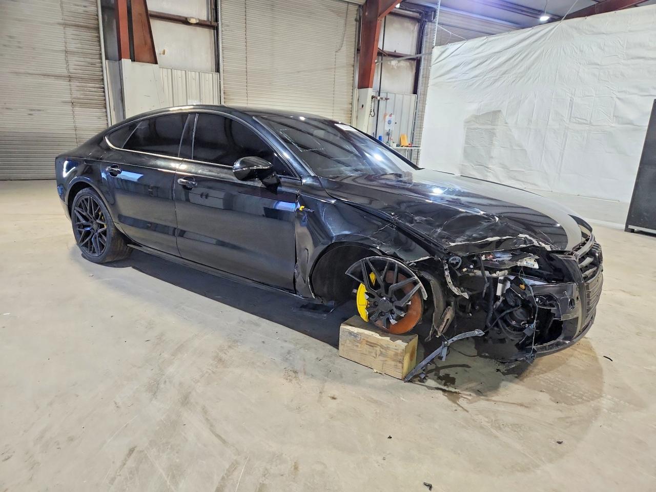 WAUWGAFC9FN004747 · 2015 AUDI A7 · 4/13
