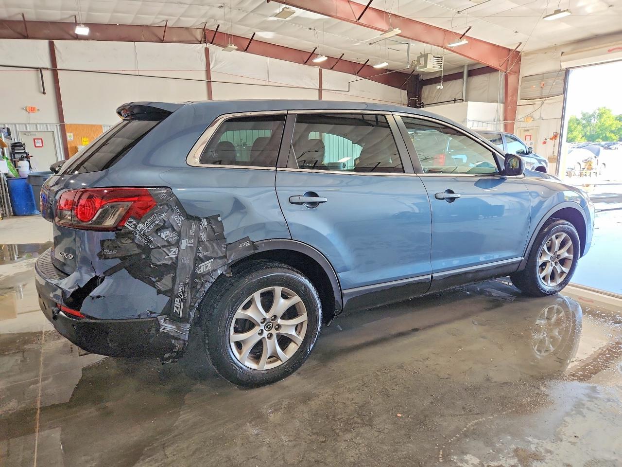 JM3TB2CA0E0443500 · 2014 MAZDA CX-9 · 3/12