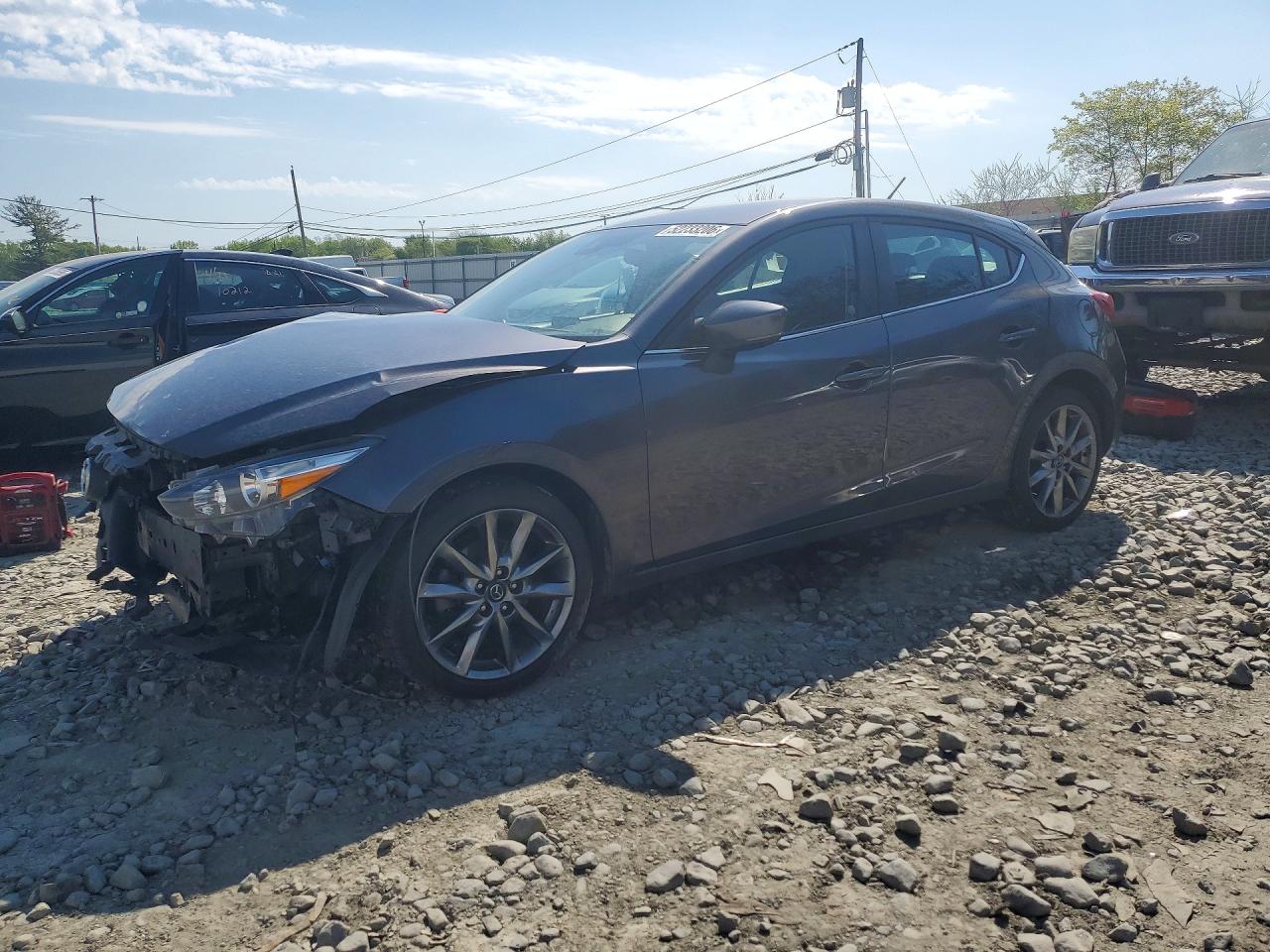 3MZBN1L39JM212459 · 2018 MAZDA 3
